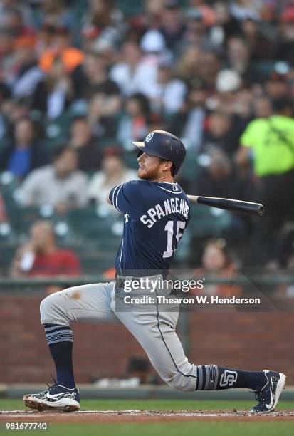 Cory Spangenberg of the San Diego Padres hits a double against the San Francisco Giants in the top of the second inning at AT&T Park on June 22, 2018...