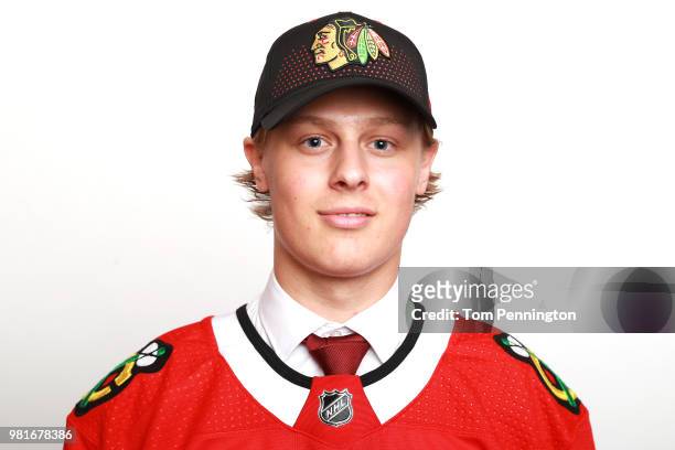 Adam Boqvist poses after being selected eighth overall by the Chicago Blackhawks during the first round of the 2018 NHL Draft at American Airlines...