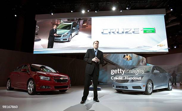 In this handout image provided by General Motors, the Chevrolet U.S. Marketing Vice President Jim Campbell unveils the Chevrolet Cruze RS and the...