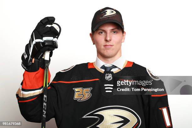 Isac Lundestrom poses after being selected twenty-third overall by the Anaheim Ducks during the first round of the 2018 NHL Draft at American...