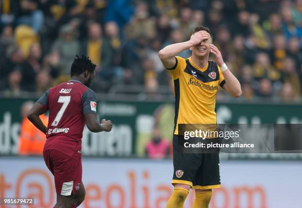 March 2018, Germany, Dresden: 2nd Bundesliga, Dynamo Dresden vs 1. FC Nuremberg in the DDV Stadium: Dynamo's Haris Duljevic gesturing next to...