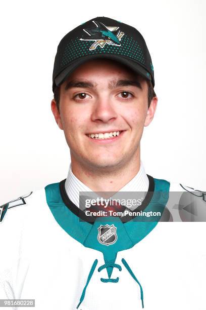 Ryan Merkley poses after being selected twenty-first overall by the San Jose Sharks during the first round of the 2018 NHL Draft at American Airlines...