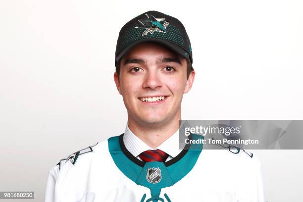 Ryan Merkley poses after being selected twenty-first overall by the San Jose Sharks during the first round of the 2018 NHL Draft at American Airlines...