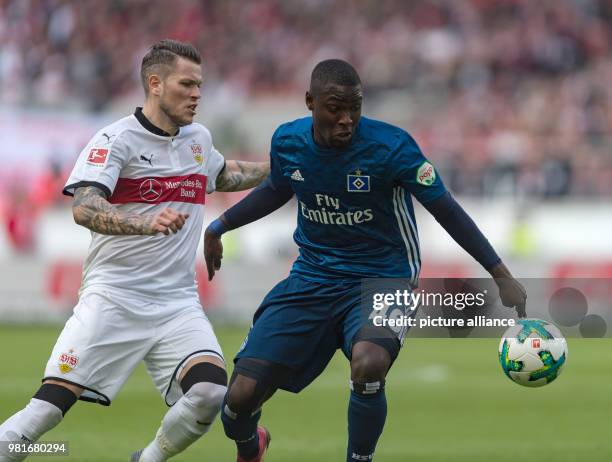 March 2018, Germany, Stuttgart: soccer: 1st Bundesliga, VfB Stuttgart vs Hamburger SV in the Mercedes Benz Arena. Stuttgart's Daniel Ginczek and...