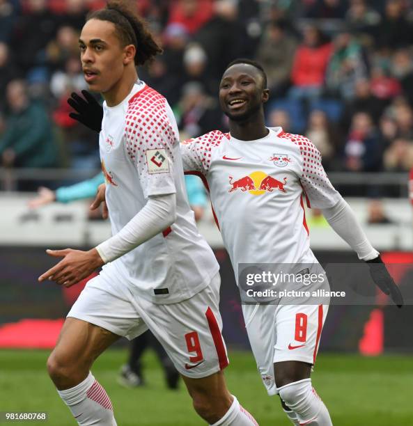 March 2018, Germany, Hannover: soccer, Bundesliga, Hannover 96 vs RB Leipzig in the HDI Arena. Leipzig's Yussuf Poulsen and Naby Keita celebrating...