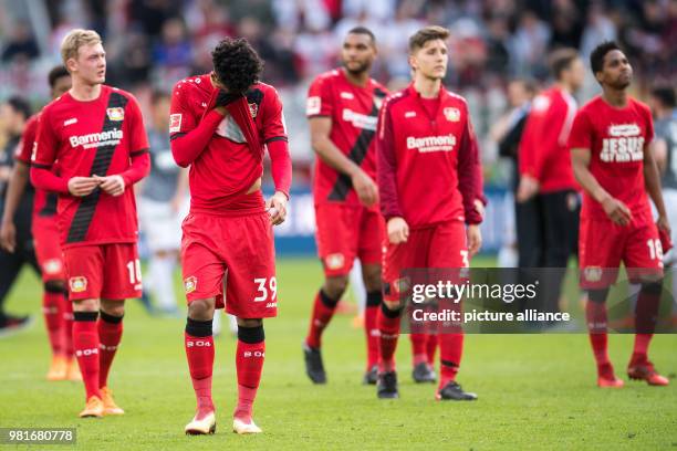 March 2018, Germany, Leverkusen: soccer, Bundesliga, Bayer Leverkusen vs FC Augsburg in the BayArena. Leverkusen's Julian Brandt, Benjamin Henrichs,...