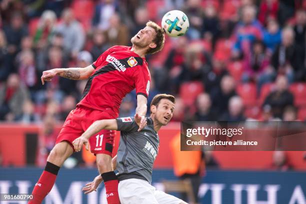 March 2018, Germany, Leverkusen: soccer, Bundesliga, Bayer Leverkusen vs FC Augsburg in the BayArena. Leverkusen's Stefan Kiessling and Augsbur's...