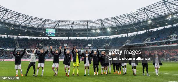 March 2018, Germany, Hannover: soccer, Bundesliga, Hannover 96 vs RB Leipzig in the HDI Arena. Leipzig's players celebrating before the fans after...