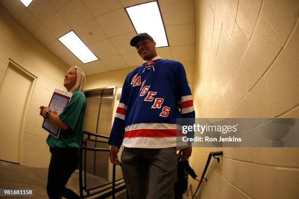 Andre Miller walks through the hallways after being selected twenty-second overall by the New York Rangers during the first round of the 2018 NHL...
