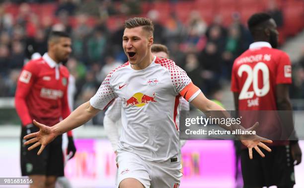 Leipzig's Willi Orban celebrates his side's second goal during the German Bundesliga soccer match between Hannover 96 and RB Leipzig the HDI Arena in...