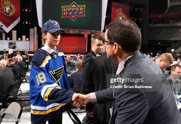 Dominik Bokk greets the team after being selected twenty-fifth overall by the St. Louis Blues during the first round of the 2018 NHL Draft at...