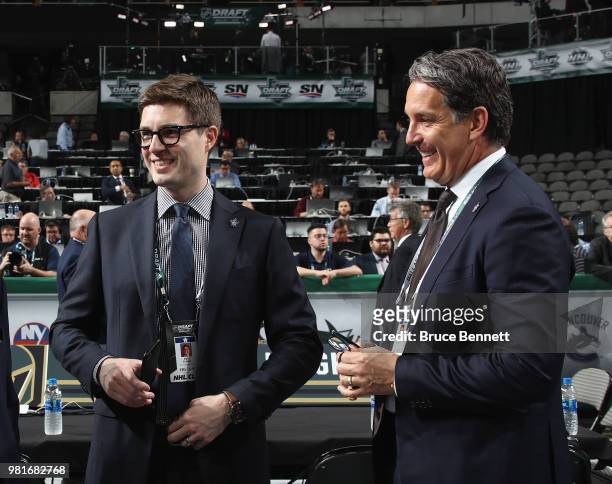 Kyle Dubas and Brendan Shanahan of the Toronto Maple Leafs chat prior to the first round of the 2018 NHL Draft at American Airlines Center on June...