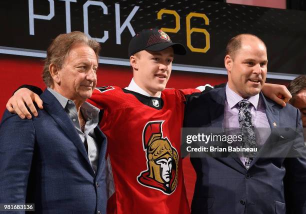 Jacob Bernard-Docker poses for a photo onstage with Ottawa Senators owner Eugene Melnyk after being selected twenty-sixth overall by the Ottawa...