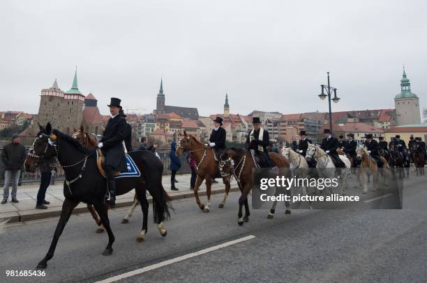 Traditionally attired Sorbians ride horses during a traditional Easter procession near the Sankt Marienstern monastery in Bautzen, Germany, 01 April...