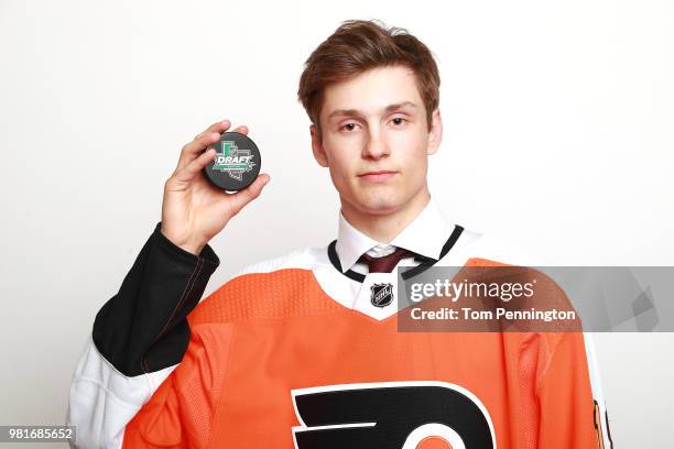 Joel Farabee poses after being selected fourteenth overall by the Philadelphia Flyers during the first round of the 2018 NHL Draft at American...