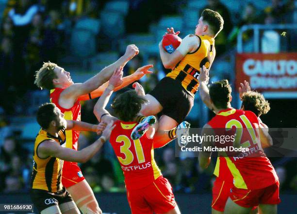 Taylor Duryea of the Hawks marks the ball during the round 14 AFL match between the Hawthorn Hawks and the Gold Coast Suns at University of Tasmania...