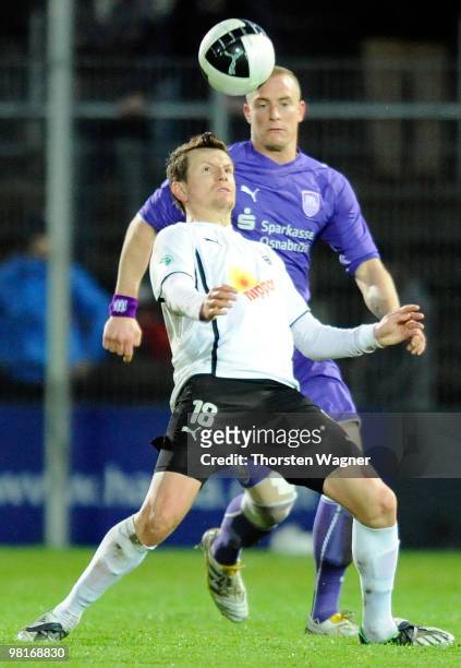 Regis Dorn of Sandhausen and Tobias Nickenig of Osnabrueck head the ball during the 3. Liga match between SV Sandhausen and VfL Osnabrueck at the...