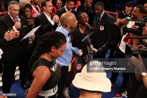 Claressa Shields celebrates winning her IBF and WBA world middleweight championship fight against Hanna Gabriels of Costa Rica at the Masonic Temple...