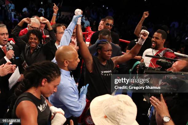 Claressa Shields celebrates winning her IBF and WBA world middleweight championship fight against Hanna Gabriels of Costa Rica at the Masonic Temple...