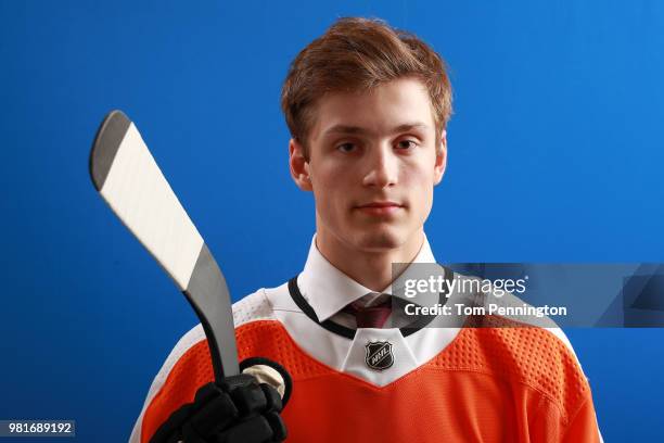Joel Farabee poses after being selected fourteenth overall by the Philadelphia Flyers during the first round of the 2018 NHL Draft at American...