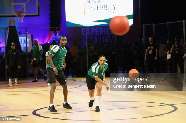 Safaree and Bridget Kelly compete during the Celebrity Dodgeball Game at 2018 BET Experience Fan Fest at Los Angeles Convention Center on June 22,...