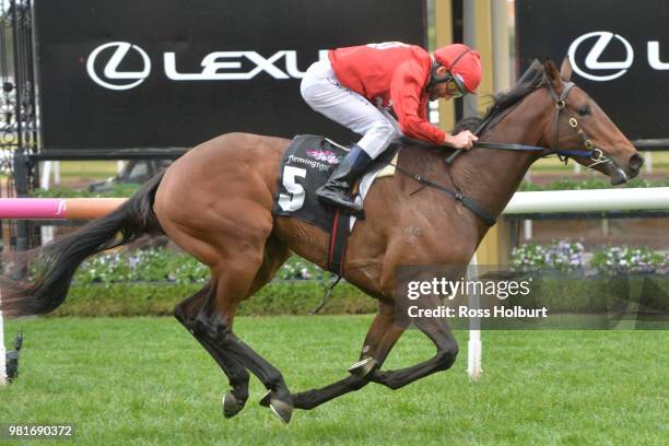 Remember the Name ridden by Damien Oliver wins the Macedon and Goldfields Handicap at Flemington Racecourse on June 23, 2018 in Flemington, Australia.