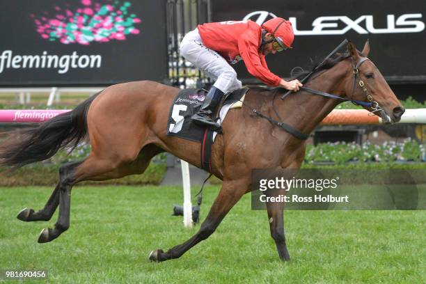 Remember the Name ridden by Damien Oliver wins the Macedon and Goldfields Handicap at Flemington Racecourse on June 23, 2018 in Flemington, Australia.