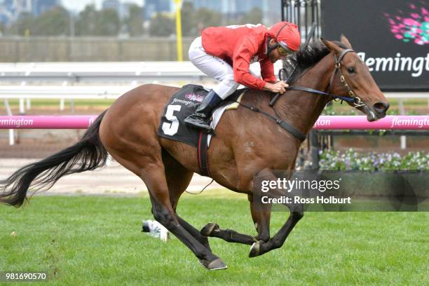 Remember the Name ridden by Damien Oliver wins the Macedon and Goldfields Handicap at Flemington Racecourse on June 23, 2018 in Flemington, Australia.