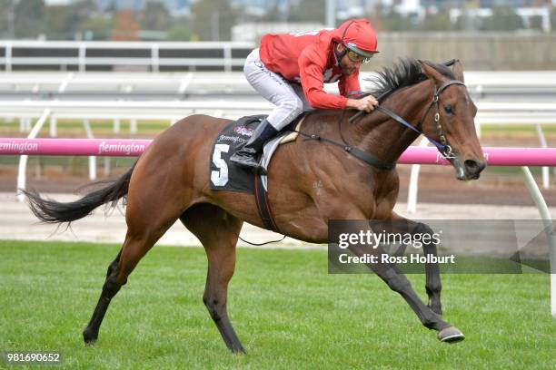 Remember the Name ridden by Damien Oliver wins the Macedon and Goldfields Handicap at Flemington Racecourse on June 23, 2018 in Flemington, Australia.