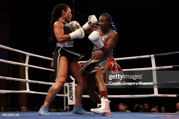 Claressa Shields battles Hanna Gabriels of Costa Rica in the first round during their IBF and WBA world middleweight championship fight at the...