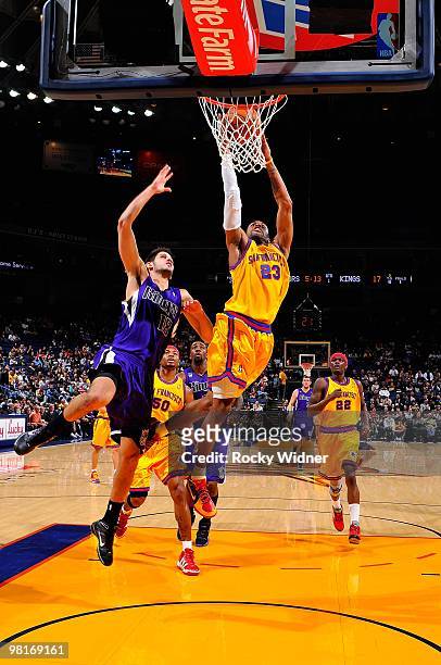 Watson of the Golden State Warriors goes to the basket against Omri Casspi of the Sacramento Kings during the game on February 17, 2009 at Oracle...