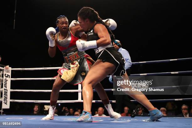 Claressa Shields battles Hanna Gabriels of Costa Rica in the second round during their IBF and WBA world middleweight championship fight at the...