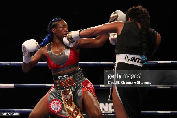 Claressa Shields battles Hanna Gabriels of Costa Rica in the fifth round during their IBF and WBA world middleweight championship fight at the...