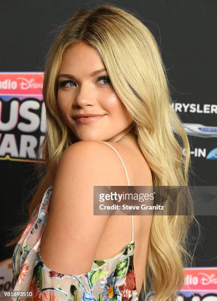 Witney Carson arrives at the 2018 Radio Disney Music Awards at Loews Hollywood Hotel on June 22, 2018 in Hollywood, California.