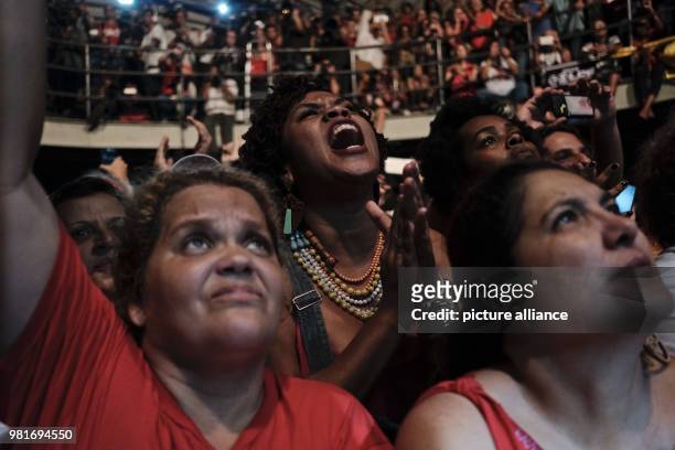 Dpatop - 02 April 2018, Brazil, Rio de Janeiro: Supporters of Luiz Inacio Lula da Silva, former president of Brazil, taking part in a political event...