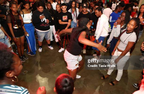 Guests dance at the Coca-Cola Music Studio at the 2018 BET Experience Fan Fest at Los Angeles Convention Center on June 22, 2018 in Los Angeles,...