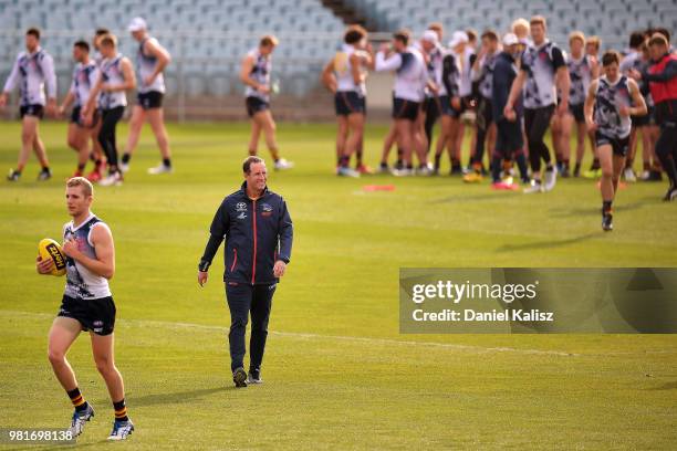 Adelaide Crows coach Don Pyke looks on during a training session held prior to a press conference at AAMI Stadium on June 23, 2018 in Adelaide,...