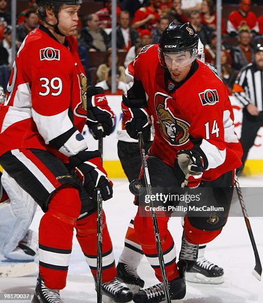 Chris Campoli of the Ottawa Senators plays the puck against the Philadelphia Flyers during their NHL game at Scotiabank Place on March 23, 2010 in...