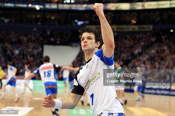 Matthias Flohr of Hamburg celebrates after scoring during the Bundesliga match between HSV Hamburg and FA Goeppingen at the Color Line Arena on March...