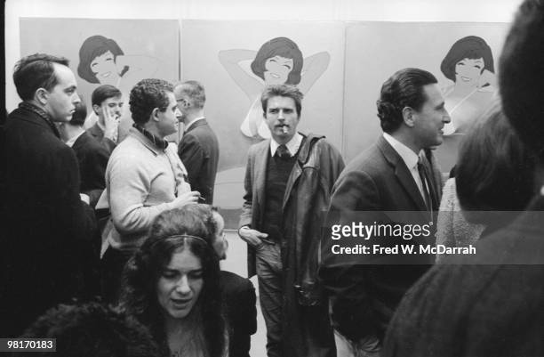 Art patrons attend the 'First International Girlie Exhibit' at the Pace Gallery, New York, New York, January 7, 1964. The exhibition explored the...