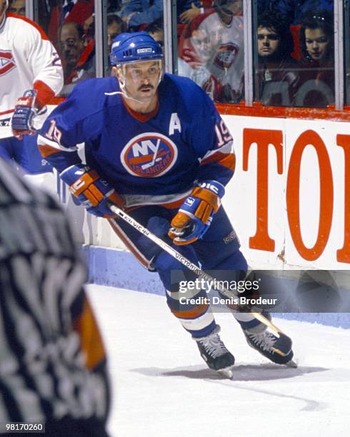 Bryan Trottier of the New York Islanders skates against the Montreal Canadiens in the 1980's at the Montreal Forum in Montreal, Quebec, Canada.