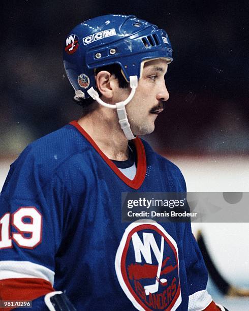 Bryan Trottier of the New York Islanders skates against the Montreal Canadiens in the 1980's at the Montreal Forum in Montreal, Quebec, Canada.