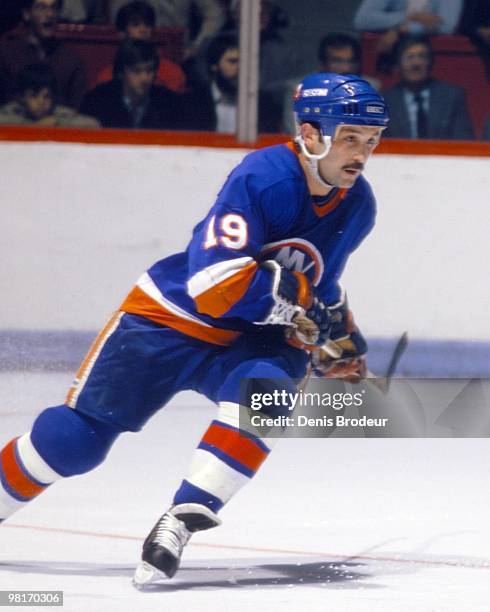 Bryan Trottier of the New York Islanders skates against the Montreal Canadiens in the 1980's at the Montreal Forum in Montreal, Quebec, Canada.