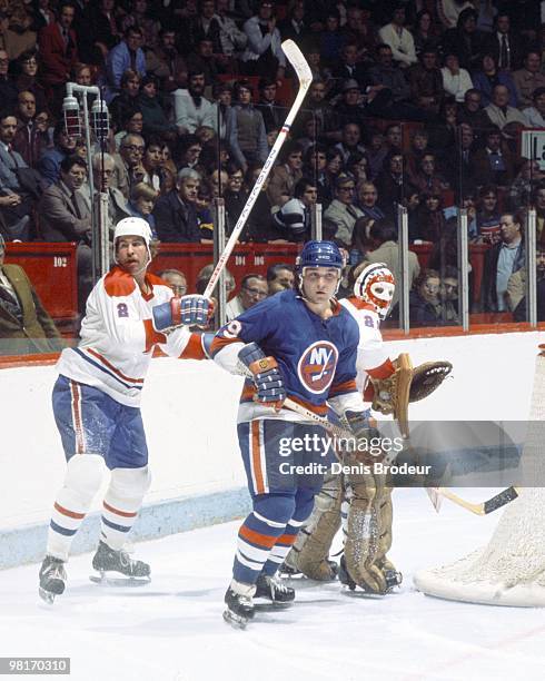 Bryan Trottier of the New York Islanders skates against Bill Nyrop of the Montreal Canadiens in the late 1970's at the Montreal Forum in Montreal,...