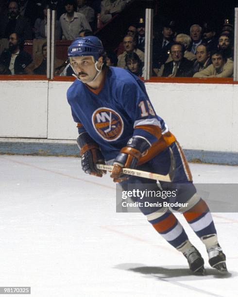 Bryan Trottier of the New York Islanders skates against the Montreal Canadiens in the 1980's at the Montreal Forum in Montreal, Quebec, Canada.