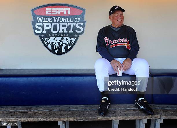 In this handout photo provided by Disney, Atlanta Braves manager Bobby Cox sits in the dugout at ESPN Wide World of Sports Complex prior to the start...
