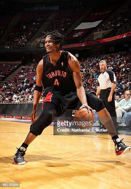 Chris Bosh of the Toronto Raptors handles the ball against the New Jersey Nets during the game on March 20, 2010 at the Izod Center in East...