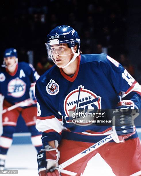 Teemu Selanne of the Winnipeg Jets skates against the Montreal Canadiens in the early 1990's at the Montreal Forum in Montreal, Quebec, Canada.