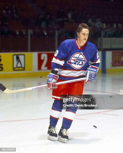 Teemu Selanne of the Winnipeg Jets practices prior to the game against the Montreal Canadiens in the early 1990's at the Montreal Forum in Montreal,...