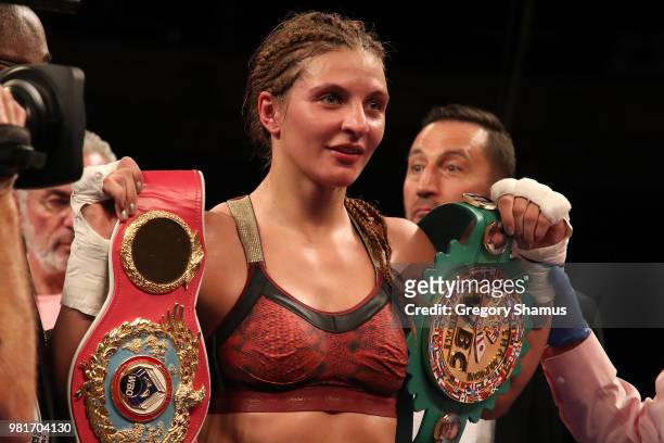 Christina Hammer of Germany celebrates winning her WBC and WBO world middleweight championship by defeating Tori Nelson at the Masonic Temple Theater...